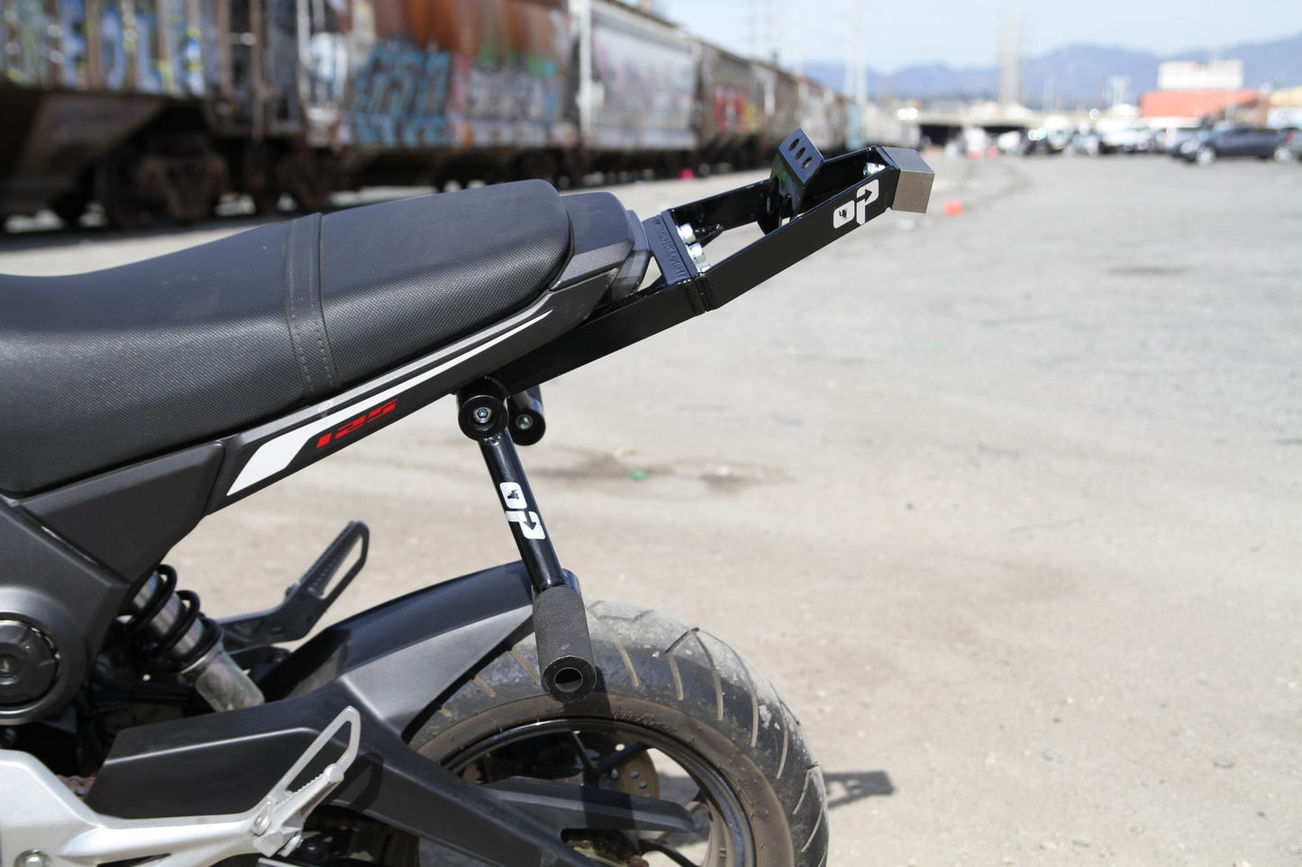 On Point 14-21 Grom SUBCAGE w/Titanium Scrape Bar (Adjustable Peg Position)