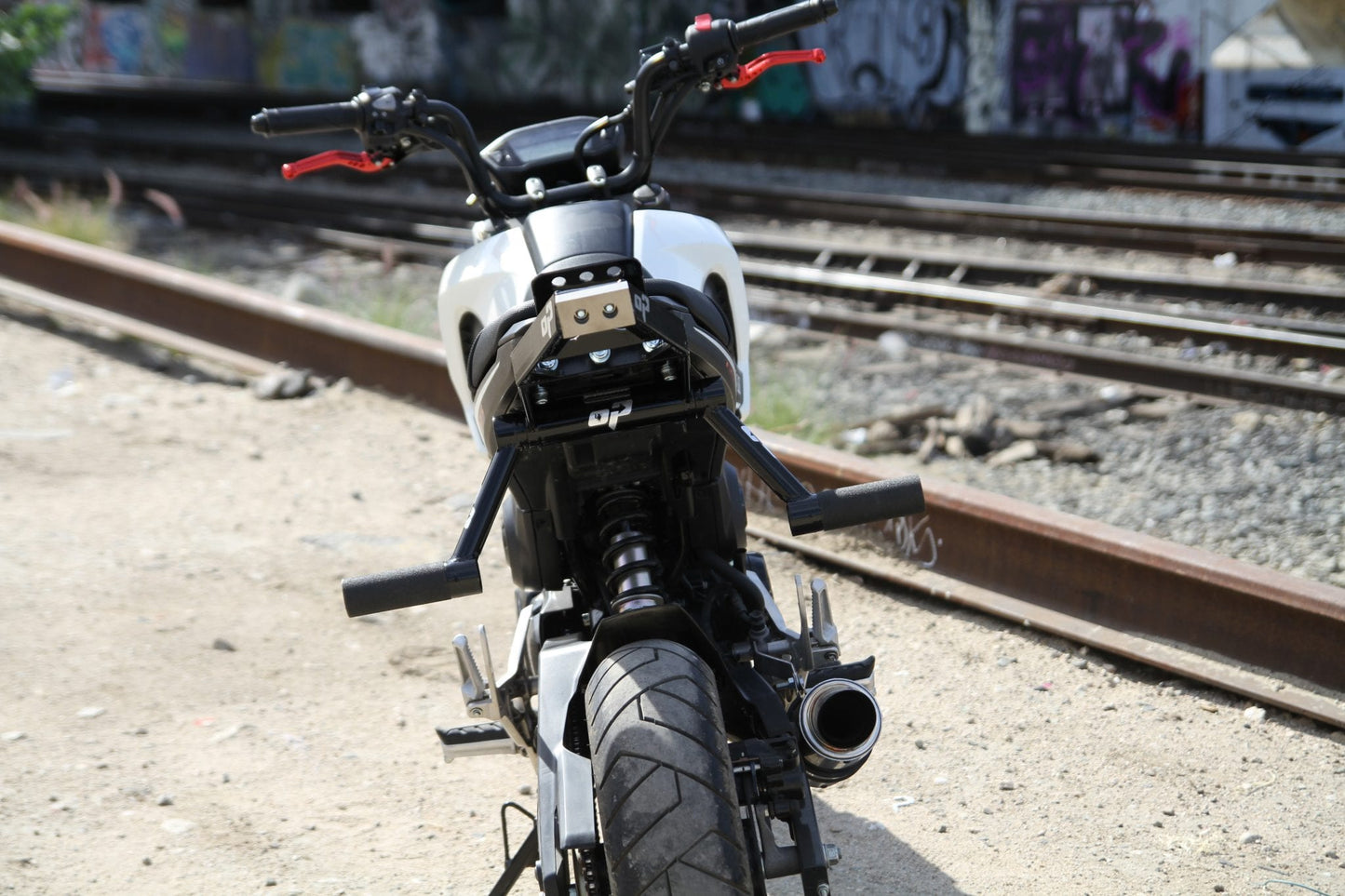 On Point 14-21 Grom SUBCAGE w/Titanium Scrape Bar (Adjustable Peg Position)