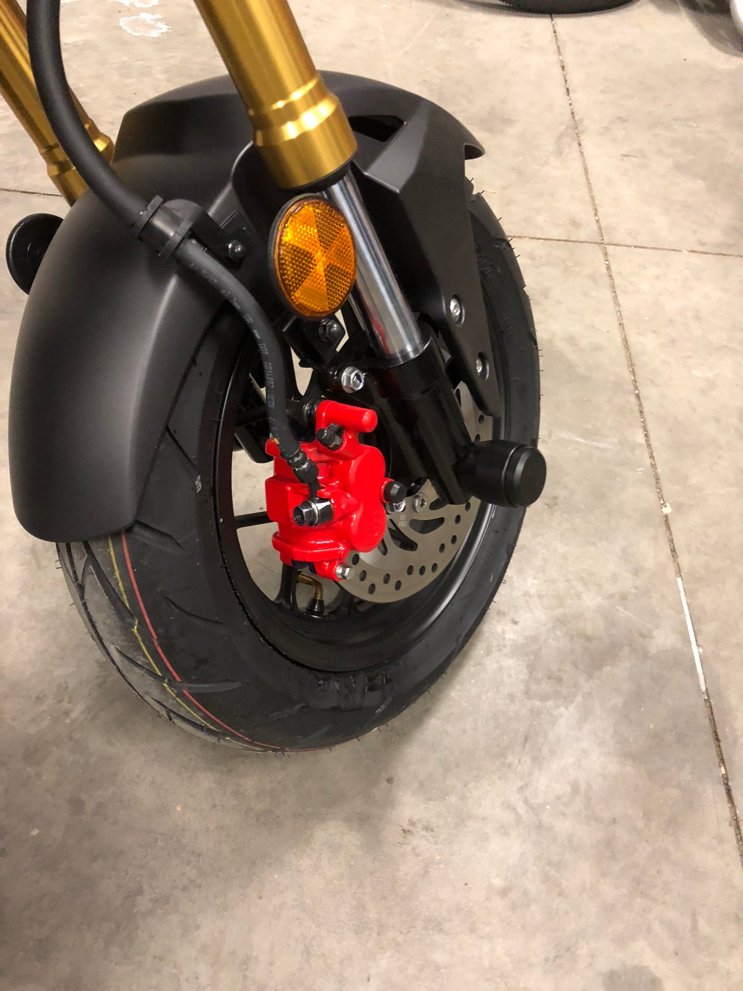 StuntPucks Kawasaki Z125 Pro Axle Sliders