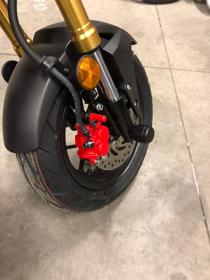 StuntPucks Kawasaki Z125 Pro Axle Sliders